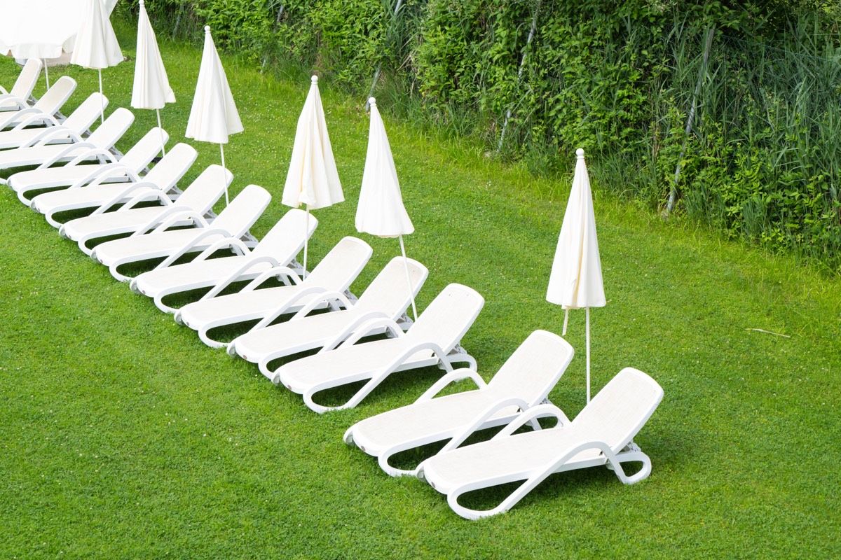 Reserved sun loungers on the private beach