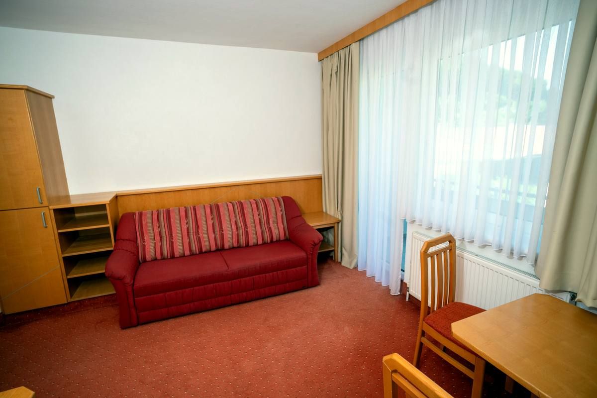 Room with balcony and lake view